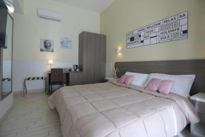 Postel nebo postele na pokoji v ubytování Suite 39 B&B