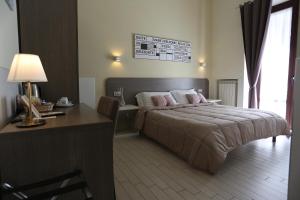 Postel nebo postele na pokoji v ubytování Suite 39 B&B