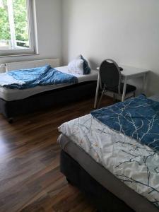 Ένα ή περισσότερα κρεβάτια σε δωμάτιο στο Hostel im Medizinerviertel