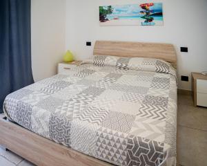 Posteľ alebo postele v izbe v ubytovaní 066 - VILLA LETIZIA, Elegante 3 PISCINA e Natura, 10 minuti da MARE e SPIAGGIE