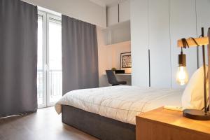 Postel nebo postele na pokoji v ubytování Cozy Living