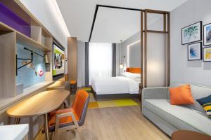 Area soggiorno di Home2 Suite by Hilton Foshan Lishui