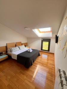 Postel nebo postele na pokoji v ubytování Maixa etxea