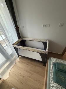 Uma cama ou camas num quarto em Apartmani Planina Divčibare