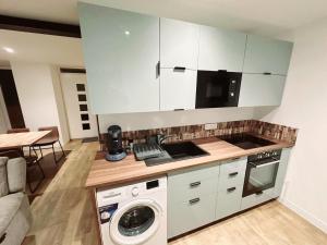 Η κουζίνα ή μικρή κουζίνα στο Appartement Djo&Juh2 +2 φωτογραφίες