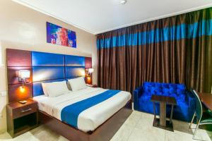 Postel nebo postele na pokoji v ubytování De Santos Hotel + 22 fotografií