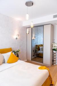Katil atau katil-katil dalam bilik di Metropolitan Luxe