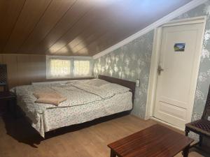 Postel nebo postele na pokoji v ubytování Tina's Homestay