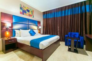 Katil atau katil-katil dalam bilik di De Santos Hotel