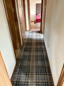 Postel nebo postele na pokoji v ubytování Hepburns Lodge 19
