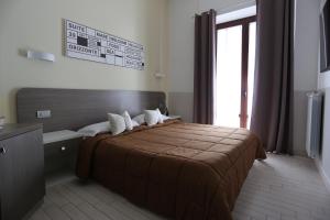 Postel nebo postele na pokoji v ubytování Suite 39 B&B