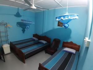 Una cama o camas en una habitación de Amila Guest