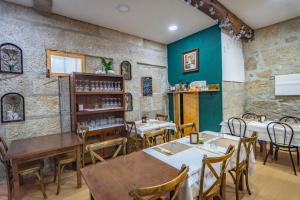 Restauracja lub miejsce do jedzenia w obiekcie Pension La Corredera