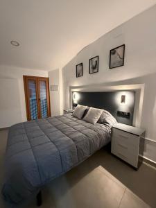 Ένα ή περισσότερα κρεβάτια σε δωμάτιο στο Caleros 8 - Apartamento 2