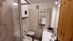 Koupelna v ubytování Il Focolare del Cermis + 13 fotografií