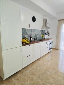 Η κουζίνα ή μικρή κουζίνα στο Basalto House Flat Tenerife South
