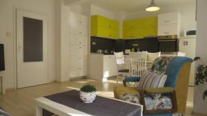 Kuchyň nebo kuchyňský kout v ubytování Apartment Sophie