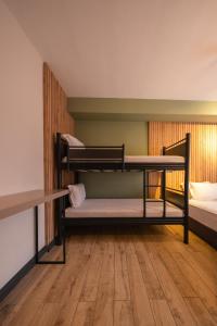 Postel nebo postele na pokoji v ubytování Polek Hotel