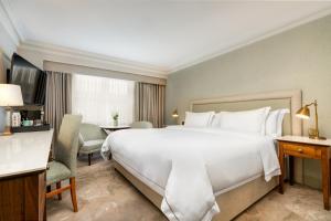 Voodi või voodid majutusasutuse Brooks Hotel toas
