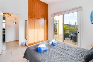 Postel nebo postele na pokoji v ubytování Villa Soraya 1 by Ezoria Villas