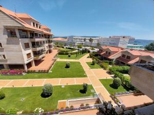 a view of the courtyard of a building at PISO DÚPLEX - ISLA DE LA TOJA (O GROVE) in O Grove