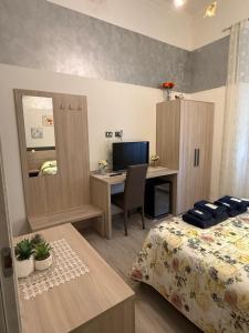 Voodi või voodid majutusasutuse Albergo Astro toas