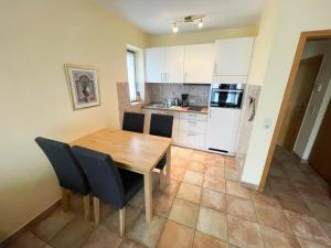 Kuchyň nebo kuchyňský kout v ubytování Haus Nordseeblick Wohnung 10