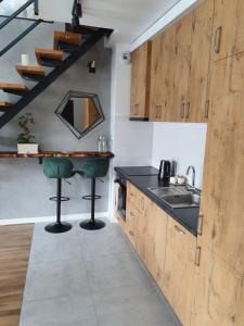 Kuchnia lub aneks kuchenny w obiekcie Relaxroom Szmaragd
