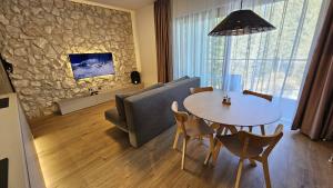 A television and/or entertainment centre at Villa Erdődy Resort