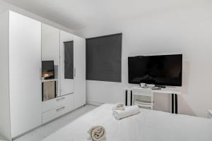 Postel nebo postele na pokoji v ubytování Las Palmas Comfort Rooms