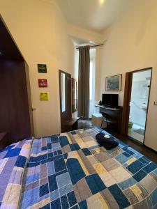 Voodi või voodid majutusasutuse Albergo Astro toas