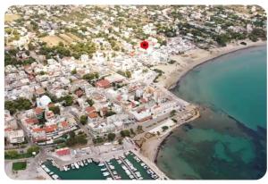 an aerial view of a city with a red circle at Beautiful Choice - near Athens airport - 50m from the sea - IQ+ in Artemida