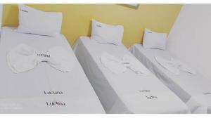 Ένα ή περισσότερα κρεβάτια σε δωμάτιο στο HOTEL LUCIANA +2 φωτογραφίες