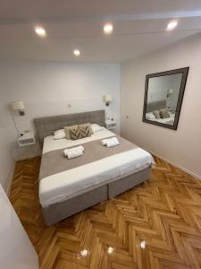 Postel nebo postele na pokoji v ubytování Palace apartment