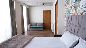 Voodi või voodid majutusasutuse Chalet In Gudauri toas