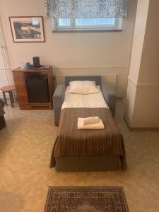 Postel nebo postele na pokoji v ubytování Budget Hotel Easystay