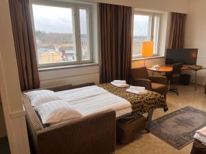 Postel nebo postele na pokoji v ubytování Budget Hotel Easystay