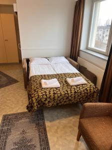 Postel nebo postele na pokoji v ubytování Budget Hotel Easystay