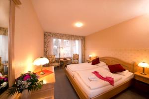 Postel nebo postele na pokoji v ubytování Hotel Heikenberg