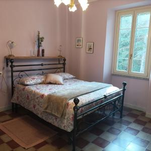 Posteľ alebo postele v izbe v ubytovaní Il giardino di San Martino