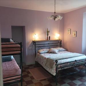 Posteľ alebo postele v izbe v ubytovaní Il giardino di San Martino