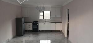 Kuchyň nebo kuchyňský kout v ubytování Falconbridge Properties