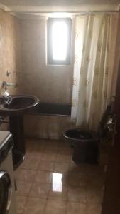 Ванная комната в Aigeira Seafront Vacation Home 0 floor