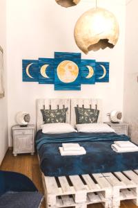 Voodi või voodid majutusasutuse The Smallest Hostel of Florence toas