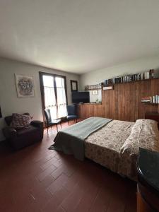 Postelja oz. postelje v sobi nastanitve Guest House nel Vigneto