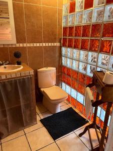 Koupelna v ubytování Bungalow cosy, détente dans la forêt - WABI + 8 fotografií