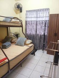 Photo de la galerie de l'établissement Cindai Homestay, à Seri Kembangan