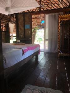 Ένα ή περισσότερα κρεβάτια σε δωμάτιο στο Horizon Eco Resort