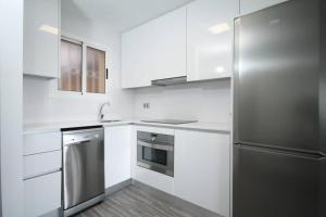Kuchyň nebo kuchyňský kout v ubytování Apartamento con vistas al Mar en Cambrils