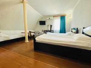Voodi või voodid majutusasutuse SD Hotel toas